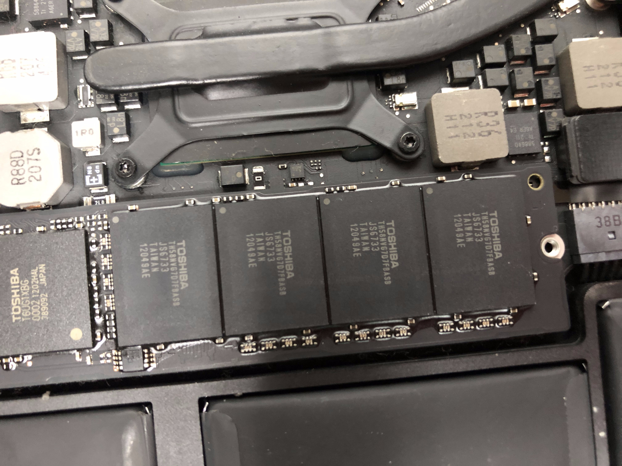 Figure 5a. Remove screw holding SSD in place