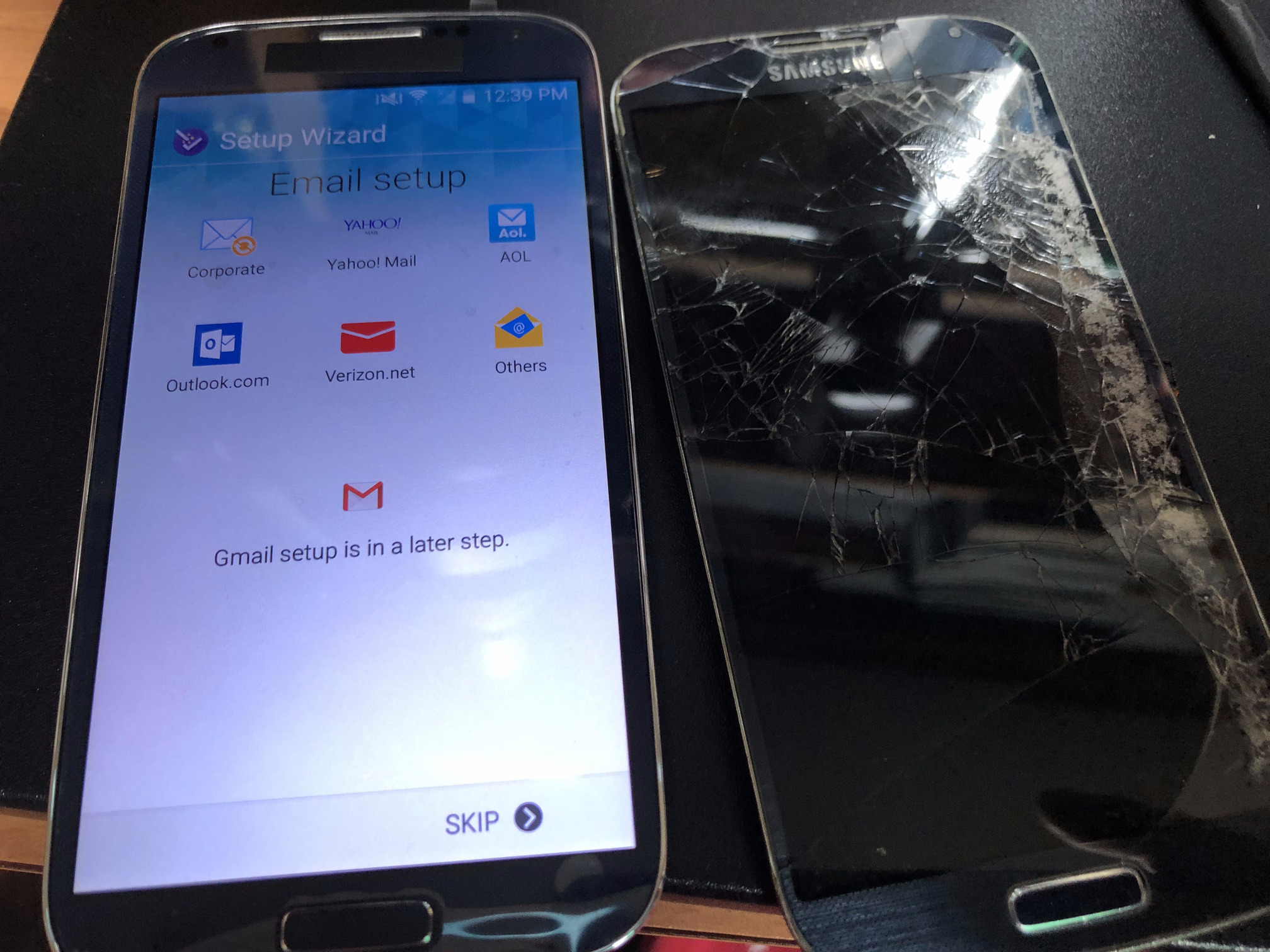 Working phone with new display module and the damaged display module to its right