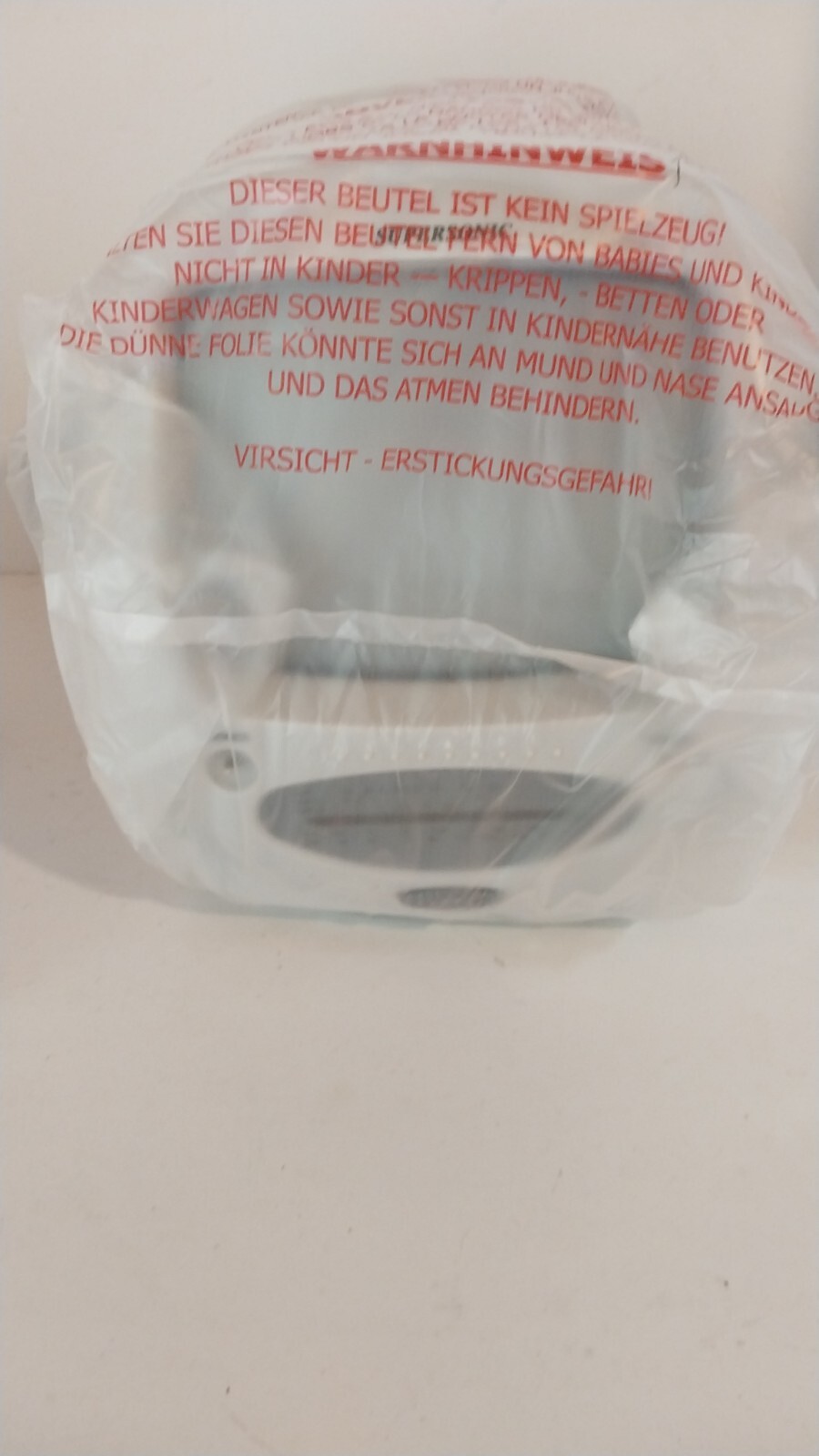 Figure 2e. Supersonic FC9600 - unboxed TV covered in plastic - front view